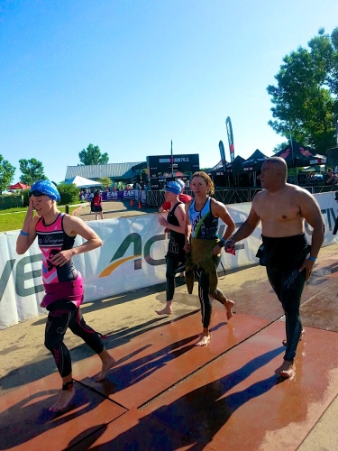 A swim PR, and exiting with other people.  (Okay, they may be doing the sprint.)