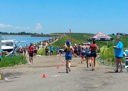 Not a gorgeous run course for sure.  Dirt path, no shade, but pretty flat.